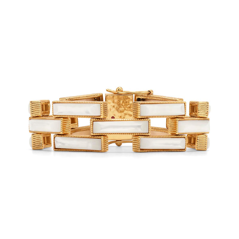 We all have different paths in life; we have to build the most important pathways ourselves with a combination of hard work and with a bit of luck. Inspired by taking the road less traveled, we paved this stunning bracelet in lustrous Mother of Pearl rectangular links in a geometric framework that's equal parts versatile, interesting and chic, to take with you every step along the way of your daily adventures.