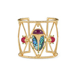 Exotic, regal and refined our stunning Sacred Scarab is an empowering talisman of renewal. Rendered with luminescent hand carved abalone shell polished into noble wings, a royal purple amethyst is set for the head and tiny tsavorite feet sit rest purposefully atop an 18K cuff. The accompanying pair of ruby Lovebugs are the catalyst and nourishment to the ongoing quest for re-newel. 