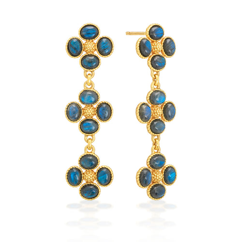 A trio of clovers descend in linear fashion for an effect that’s equally streamlined and romantic. Made with luminous orbs of blue labradorite gemstones with golden berry centers, this set brings femininity and a little luck to carry with you wherever you go.