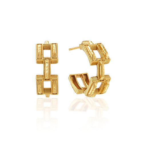 These statement hoop earrings are made with rectangular links of hammered gold, symbolic of the many different paths we take in life. Wear this pair as you follow your own yellow brick road (in fabulous style!), whether it's along city streets, country lanes, the halls of academia or garden pathways.