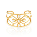 Inspired by Capucine’s incomparable grandmother, Monique De Wulf, who was a true Grande Dame de Paris; unwavering in her spiritual strength, devotion to family (with 9 children!) and passion for dancing. This is a power piece. A subtle compass motif with the points of north, south, east and west in gold and mother of pearl serves as a reminder to trust your instincts and follow your own true north, your inner light. Let your conscience be your compass and you will always choose wisely.