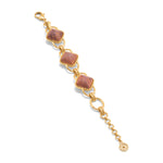 This versatile piece elevates the classic chain bracelet with an unexpected twist, artfully rendered with earthy teak beads and a subtly ornate gold motif for a dash of understated drama. Inspired by the effortless-yet-impeccable style that my fabulous French aunt achieves every day, who is able to take everything from a ballgown to a t-shirt, and make a moment of it. Pair with our Blandine Chain necklace to complete the look.