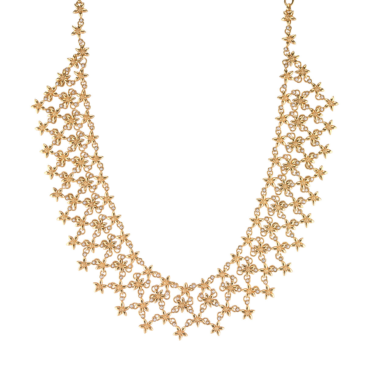 This cascade of jasmine flowers is as light and airy as gilded lacework and comes festooned with tiny luminous pearls. Equally stunning and refined, this statement necklace dazzles. Each delicate flower is deftly linked to the other with un-rushed skill and precision so that it moves gracefully with the wearer.