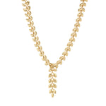 As if crafted by Helen of Troy herself, our laurel wreath glides across the skin with a watery caress, enhancing the beauty of the wearer with its golden gleam. An ancient symbol of triumph, this exquisitely simple garland is a subtle power piece for seizing every day, conquering boardrooms, and sailing down the red carpet with classic style and grace. This convertible necklace can be worn with or without the center drop, so that you can adjust it to suit your neckline.