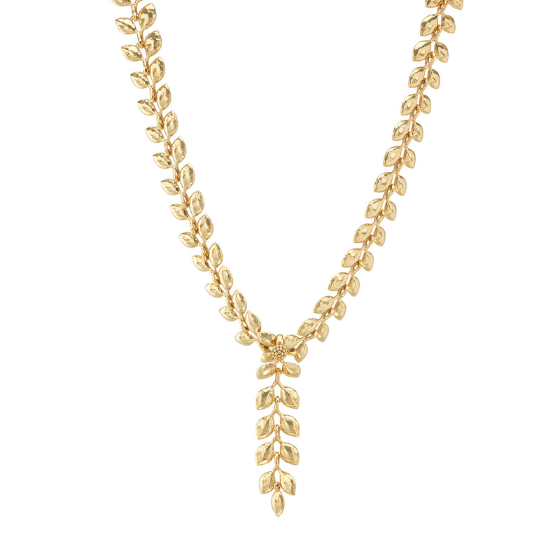 As if crafted by Helen of Troy herself, our laurel wreath glides across the skin with a watery caress, enhancing the beauty of the wearer with its golden gleam. An ancient symbol of triumph, this exquisitely simple garland is a subtle power piece for seizing every day, conquering boardrooms, and sailing down the red carpet with classic style and grace. This convertible necklace can be worn with or without the center drop, so that you can adjust it to suit your neckline.