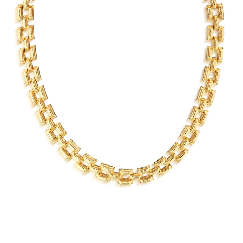We all have different paths in life; we must build the most important ones ourselves with a combination of hard work and a bit of luck—stone by stone, brick by brick. Inspired by taking the road less traveled, we paved this stunning statement necklace in rectangular, hammered gold links in a geometric framework that's equal parts versatile, eye-catching and chic, to take with you every step along the way of your daily adventures.