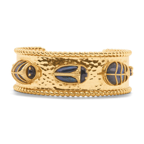 Exotic, regal and refined, our stunning Scarab is an empowering talisman of resilience. A certain conversation-starter, this striking cuff is adorned with a charming Scarab family marching in a tidy line, with their luminescent blue labradorite wings and black onyx heads. Especially fun and fabulous when paired with our Large Scarab cuff.