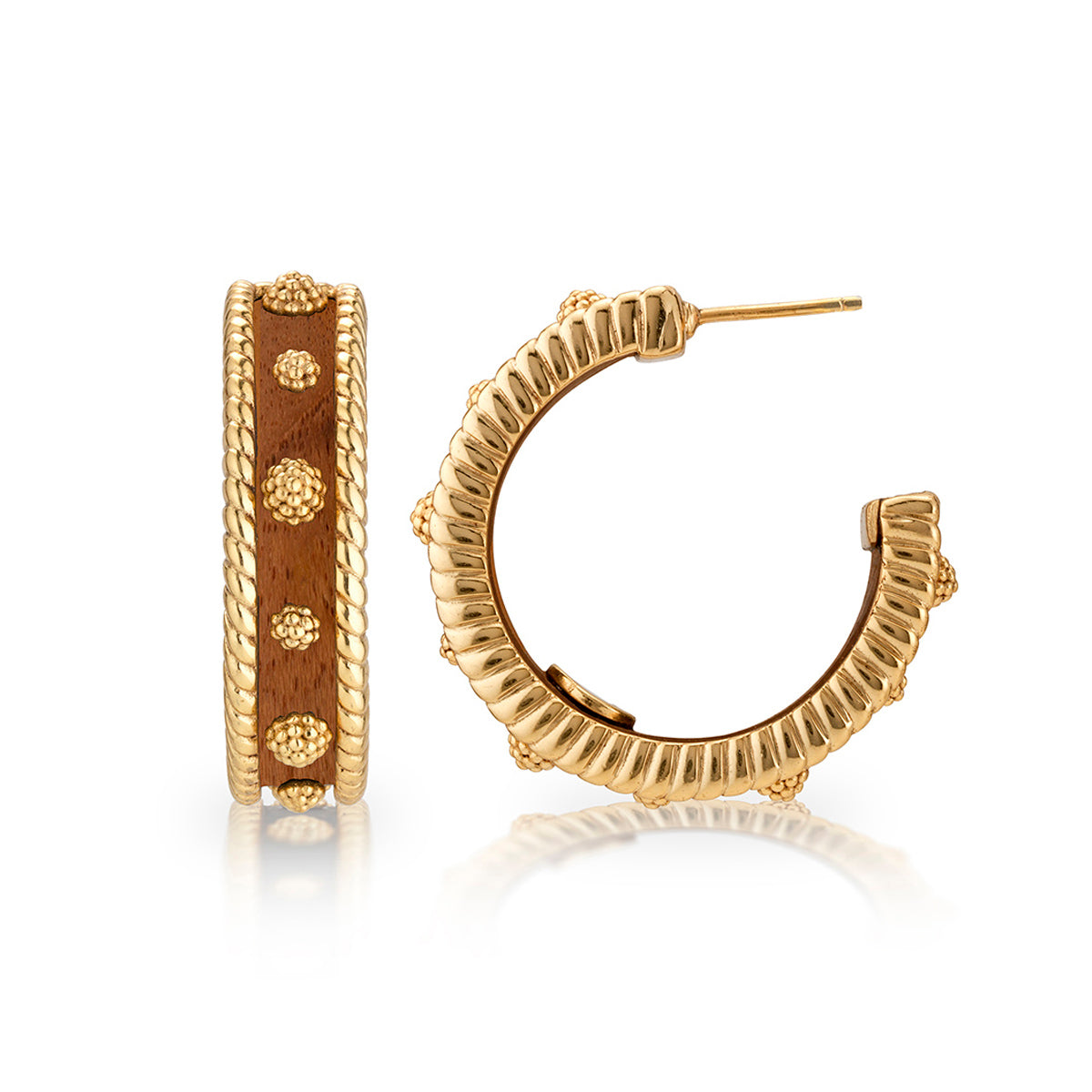 Gold hoop earrings with textured design on a white background