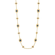 This double-sided chain necklace is a vision in bright, gleaming gold, interspersed with all-seeing eyes of lush green onyx and intense blue labradorite gemstones that flip throughout the day with a wink of playfulness. Mystical yet modern, this eye-catching piece is inspired by the cosmic place between your heart (feeling) and head (logic). Wear it long or doubled around your neck for a layered look and be reminded to trust your instincts, your inner sight.