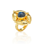 Color outside the lines with this striking statement ring that spotlights an intense blue labradorite gemstone within our Mystic Eye motif in bright, hammered gold for an effect that’s elegant and fabulously unique. Inspired by that cosmic place between your heart (feeling) and your head (logic), wear this third eye and feel empowered to always trust your instincts—your inner sight shines bright.