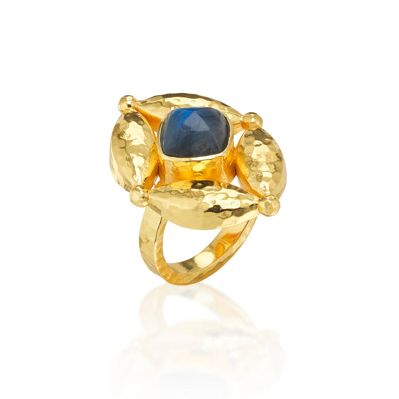 Color outside the lines with this striking statement ring that spotlights an intense blue labradorite gemstone within our Mystic Eye motif in bright, hammered gold for an effect that’s elegant and fabulously unique. Inspired by that cosmic place between your heart (feeling) and your head (logic), wear this third eye and feel empowered to always trust your instincts—your inner sight shines bright.