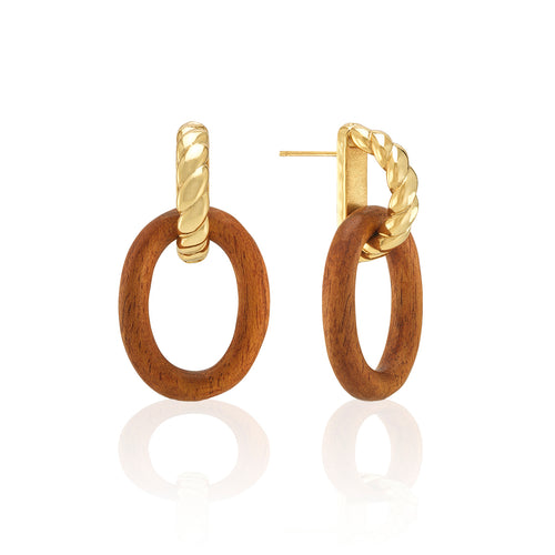 Channel your earth goddess vibes every day with this unique pair of hand-carved link earrings of polished teak wood, suspended from ropes of gleaming gold. This set is fabulously versatile, understated, and grounding—for work to weekend, day-to-night style.