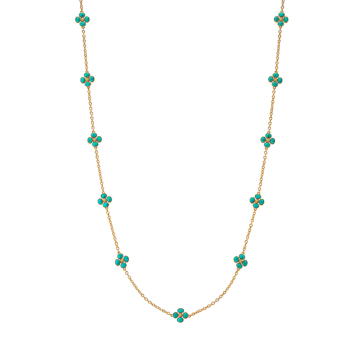 This dainty, double-sided station chain necklace is a vision in bright, gleaming gold and turquoise blue, interspersed with our clever double-sided clovers that playfully flip throughout the day—from turquoise clovers with golden berry centers to golden clovers with turquoise centers.
