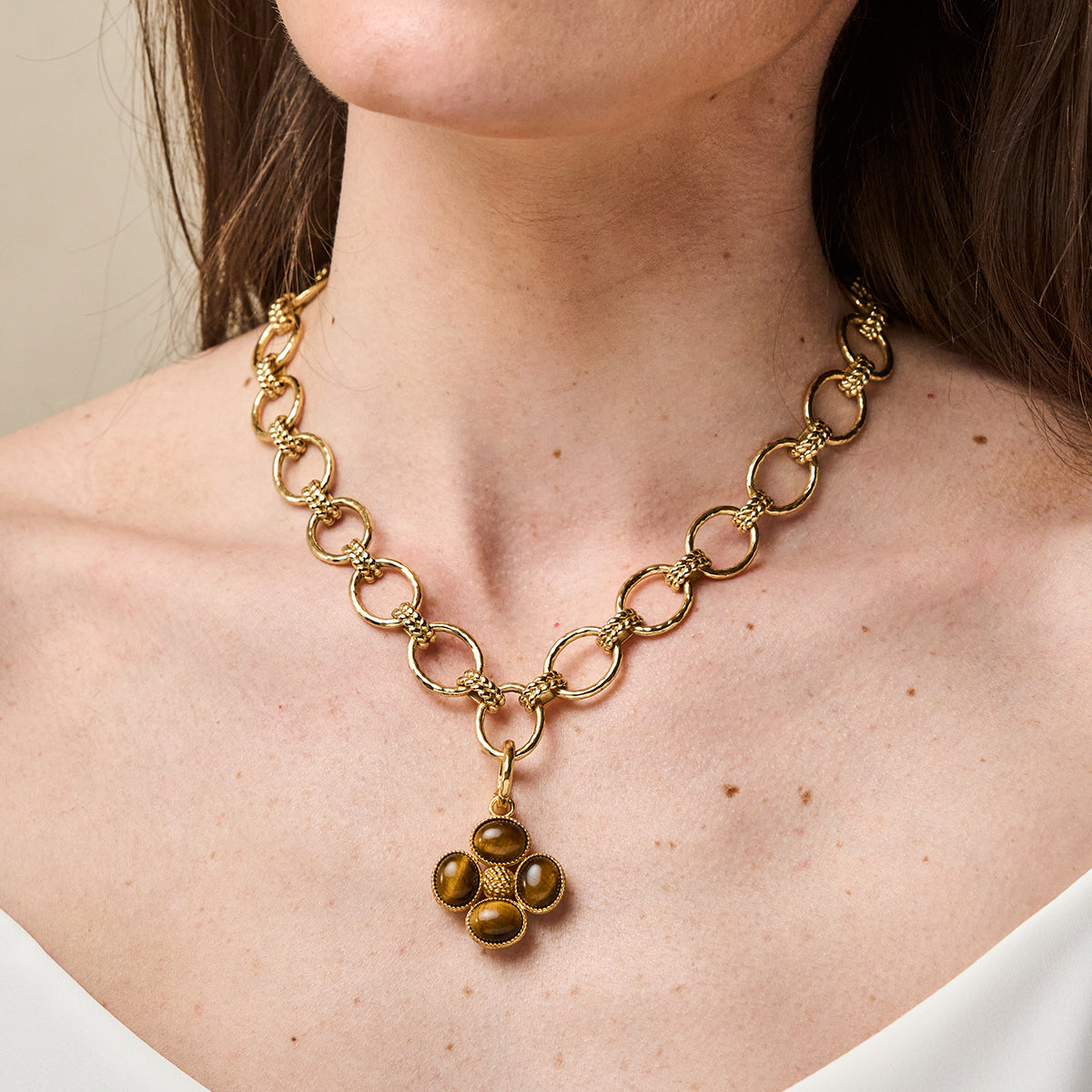 Berry Clover Double Sided Charm/Pendant - Tiger's Eye close up of front of pendant on necklace