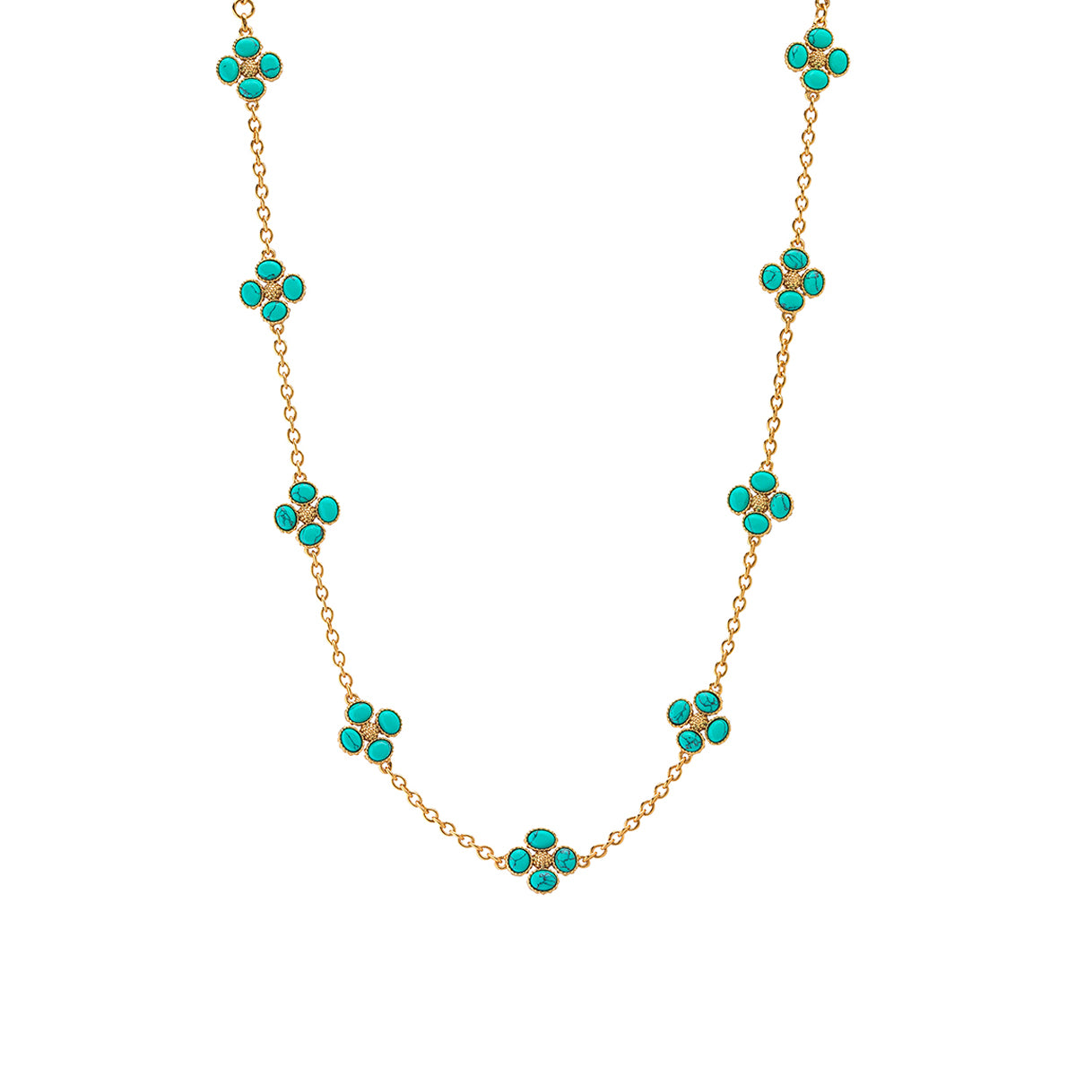 This dainty, double-sided station chain necklace is a vision in bright, gleaming gold and turquoise blue, interspersed with our clever double-sided clovers that playfully flip throughout the day—from turquoise clovers with golden berry centers to golden clovers with turquoise centers.