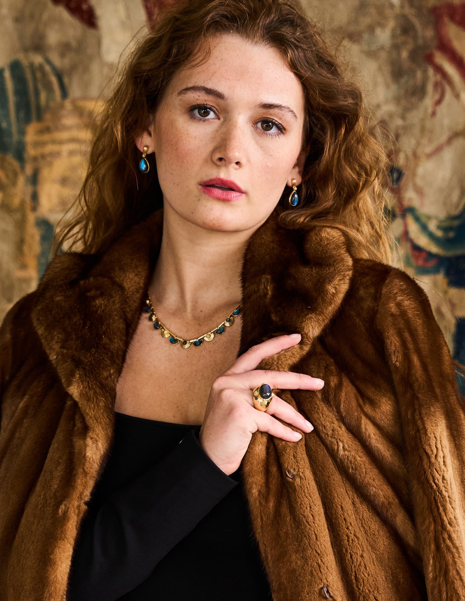 Woman wearing Cleopatra and Monique jewelry