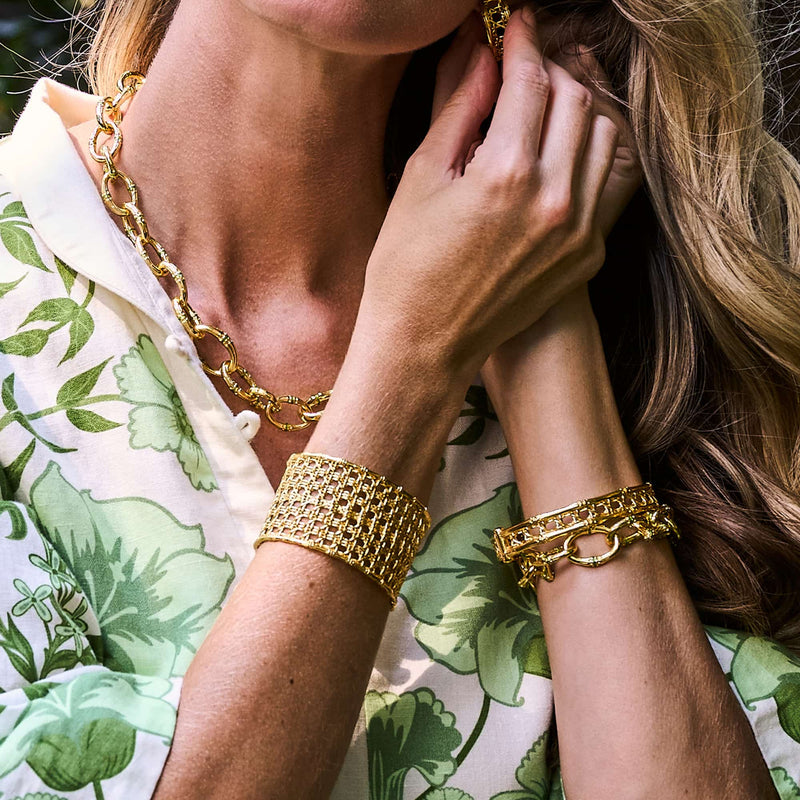 Woman wearing Capucine De Wulf Bangkok Bamboo bracelets and necklace