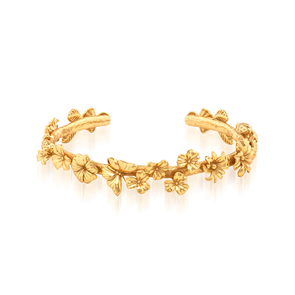 Meadow wildflowers and butterflies festoon a golden vine to compose this petite bracelet cuff that’s as elegant as it is enchanting. Look closely and discover gilded wings, curling leaves and polka-dotted ladybugs. Fabulous on its own or to enliven any bracelet stack with a touch of garden romance.