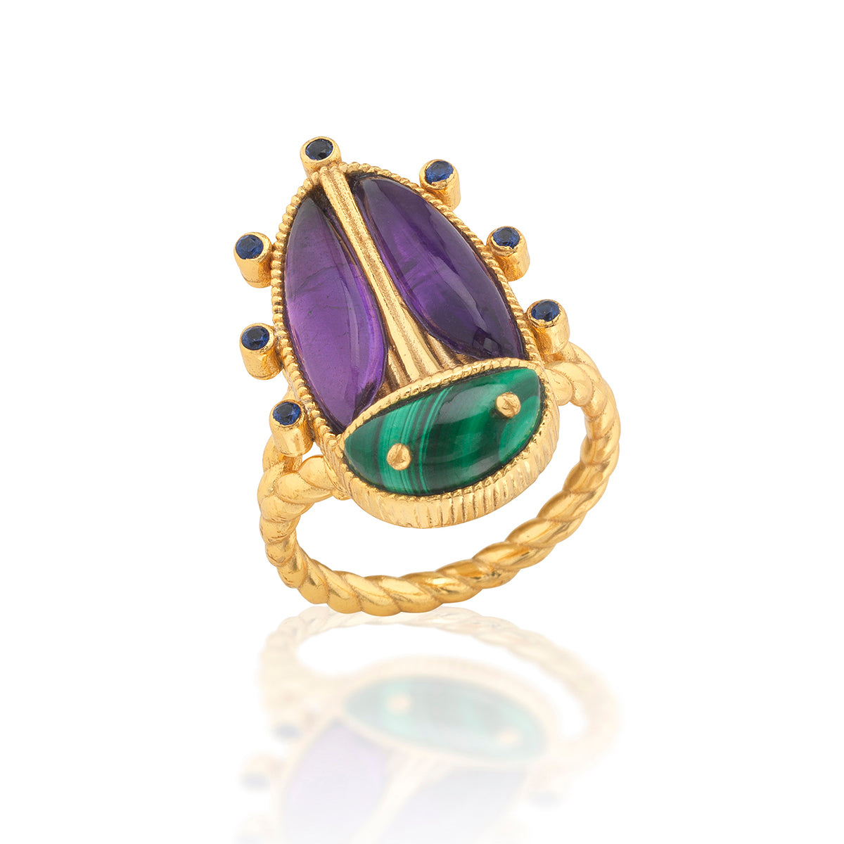 This colorful character is an empowering talisman of resilience to carry with you every day. Our version of an ancient Egyptian amulet, this sacred scarab features luminous amethyst wings with a polished malachite head and tiny feet atop a gold ring band.