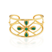 Inspired by Capucine’s incomparable grandmother, Monique De Wulf, who was a true Grande Dame de Paris; unwavering in her spiritual strength, devotion to family (with 9 children!) and passion for dancing. This is a power piece. A subtle compass motif with gorgeous green malachite serves as a reminder to trust your instincts and follow your own true north, your inner light. Let your conscience be your compass and you will always choose wisely.
