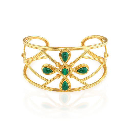 Inspired by Capucine’s incomparable grandmother, Monique De Wulf, who was a true Grande Dame de Paris; unwavering in her spiritual strength, devotion to family (with 9 children!) and passion for dancing. This is a power piece. A subtle compass motif with gorgeous green malachite serves as a reminder to trust your instincts and follow your own true north, your inner light. Let your conscience be your compass and you will always choose wisely.