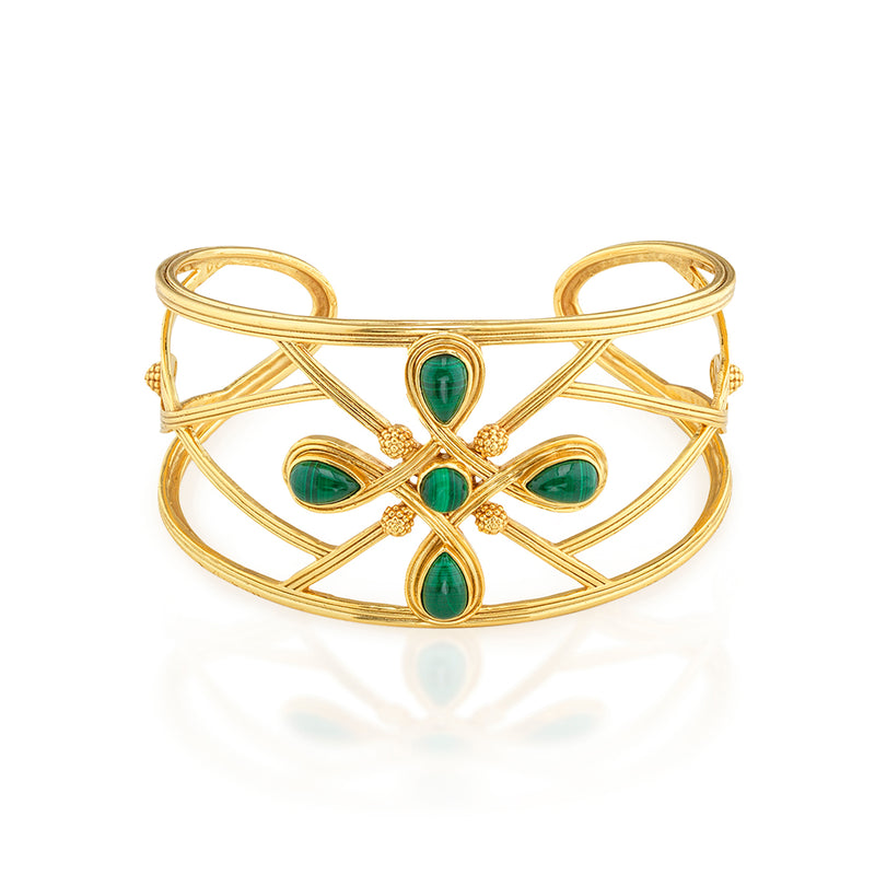 Inspired by Capucine’s incomparable grandmother, Monique De Wulf, who was a true Grande Dame de Paris; unwavering in her spiritual strength, devotion to family (with 9 children!) and passion for dancing. This is a power piece. A subtle compass motif with gorgeous green malachite serves as a reminder to trust your instincts and follow your own true north, your inner light. Let your conscience be your compass and you will always choose wisely.