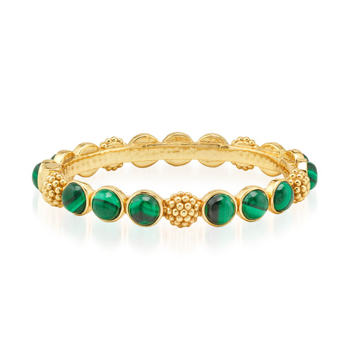 Trios of delectable malachite gem-drops are united by a sprinkling of golden berries to create this regal bangle that can elevate a pair of jeans or bring the perfect splash of glamor to your lucky business suit in a snap. Either way, it’s perfect for queening over your to-do list with exquisite style and grace. Stunning on its own, even better in a stack!