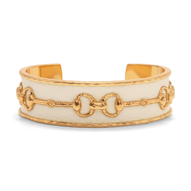 Richly textural and incredibly chic in white faux leather for layering into bracelet stacks or to stand alone, featuring our golden Snaffle Bit motif to represent the majesty of horses, unbound freedom, and unbridled joy to carry with you, wherever you may roam.