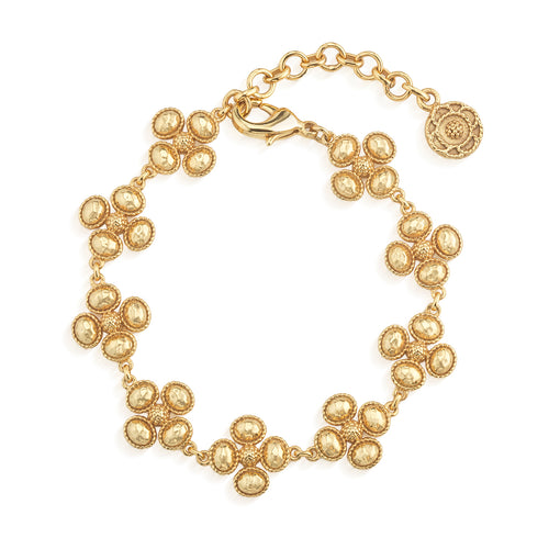 Better than finding a lucky clover, this stunning bracelet is like stumbling upon a field full of them, with gleaming golden clovers united in linear fashion. This go-to piece layers beautifully in a bracelet stack, is fabulously versatile, and elevates your ensemble with a splash of serendipity.