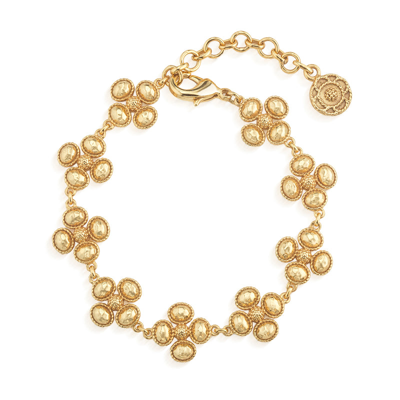 Better than finding a lucky clover, this stunning bracelet is like stumbling upon a field full of them, with gleaming golden clovers united in linear fashion. This go-to piece layers beautifully in a bracelet stack, is fabulously versatile, and elevates your ensemble with a splash of serendipity.