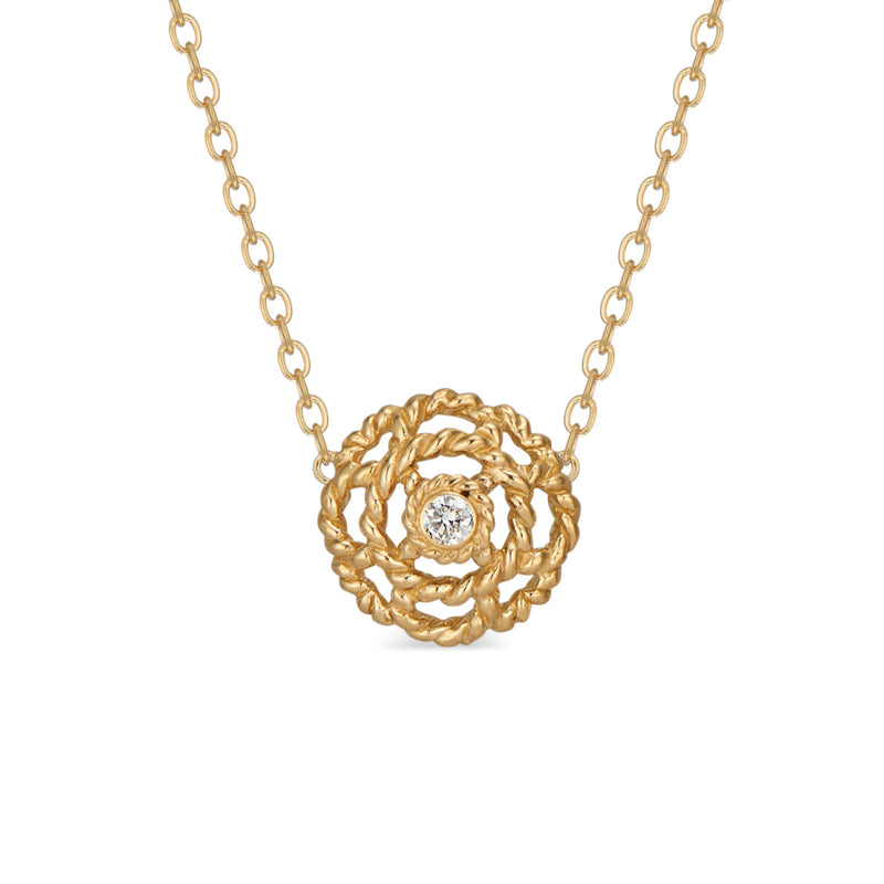 Our iconic blossom, a symbol for spreading Love, graces this petite pendant necklace, which features a single sparkling diamond nestled at its center set in 18K gold.
