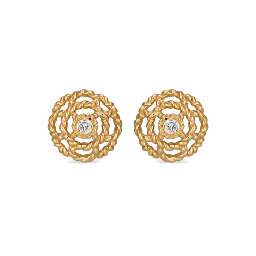 Our iconic blossom, a symbol for spreading Love, has a little diamond nestled at its center set in 18K gold. A classic everyday &amp; everywhere pair of stud earrings.