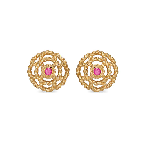  Our iconic blossom, a symbol for spreading Love, has a little ruby nestled at its center set in 18K gold. A classic everyday &amp; everywhere pair of stud earrings.