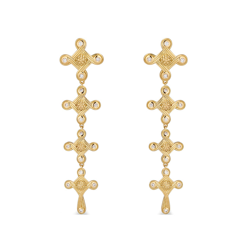 A subtle compass signifying an implicit trust of your own instincts, these linear earrings feature diamonds set in 18K gold as a reminder to follower your true north and to let your conscience be your compass. These gorgeous earrings effortlessly transition from day to evening.