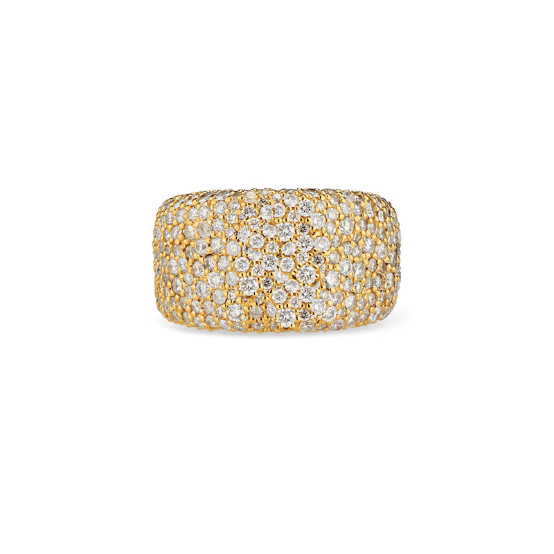 The diamonds in this decadent ring glisten like over-flowing treasure. An updated classic with variegated stones sizes tightly nested in pirate sized chunk of gold. 