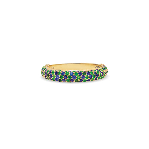 The vibrant blue sapphires and citrus green tsavorites in this elegant ring glisten like over-flowing treasure. An updated classic with variegated stones sizes tightly nested in pirate sized chunk of gold.