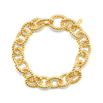 This small rope link bracelet carries a regal essence and looks just as gorgeous with a pair of jeans as it does with a cocktail dress. To complete your set, the Victoria Small Chain Necklace matches exactly, and you can even link the bracelet and necklace together to create a long statement necklace.
